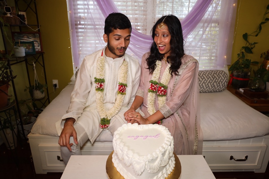 Rajul and Abdullah with their engagement cake