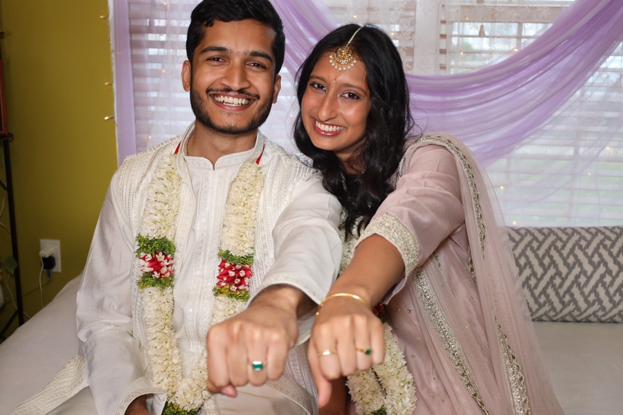 Rajul and Abdullah showing their rings